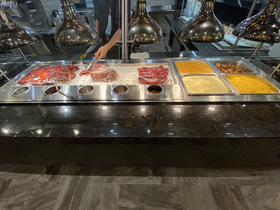 Clean dining room with buffet counters.
