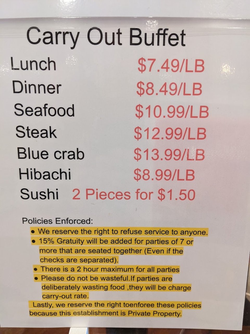 Printed buffet pricing for weekday and weekend meals.